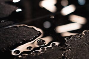 shallow focus photography of liquid